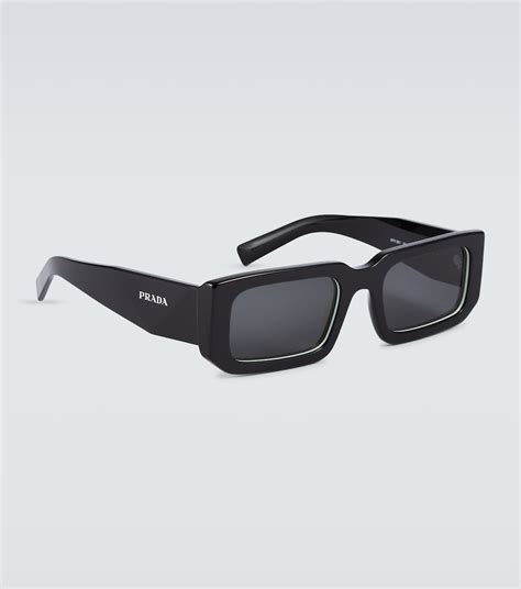 Lunettes de soleil rectangulaires Symbole en noir – Prada